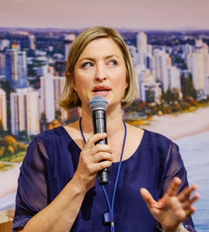 Kristina Agustin speaking at industry conference